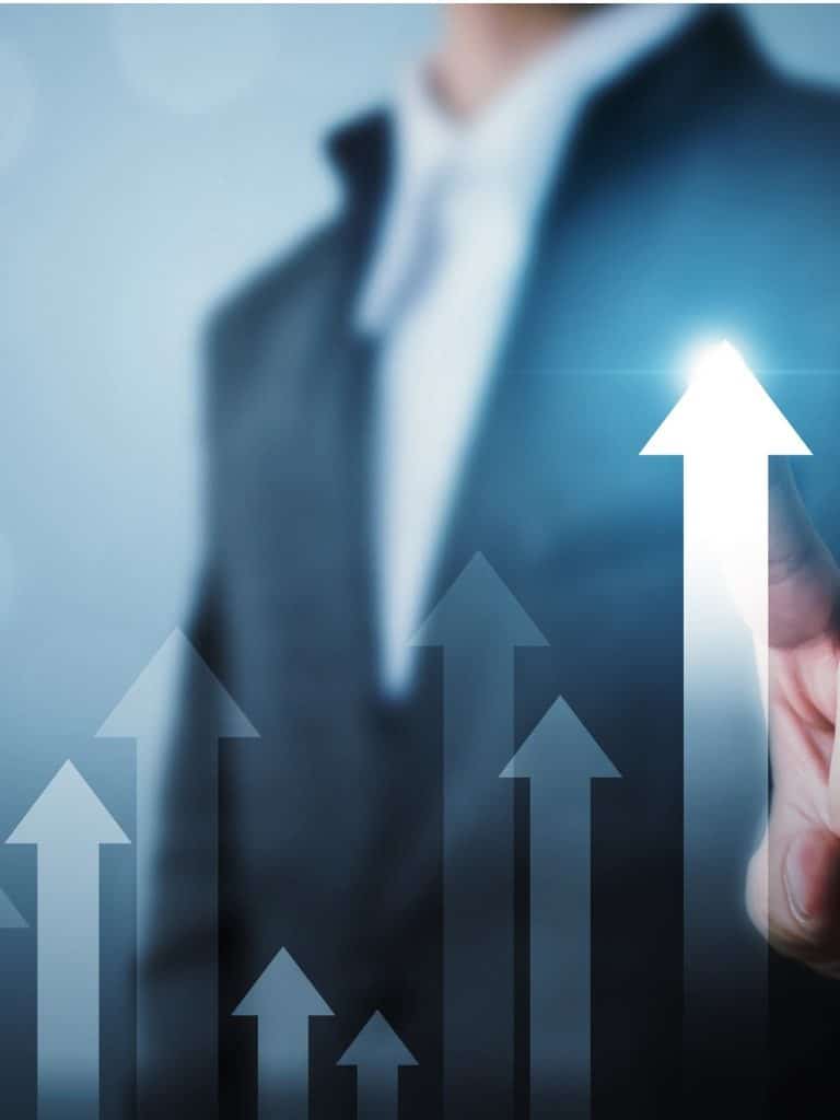business man pointing at arrows facing up